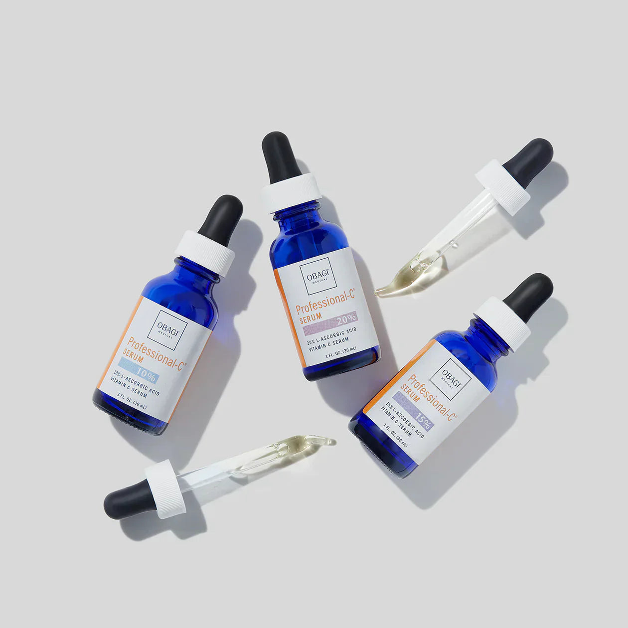 three bottles of a obagi professional c 20 percent serum with droppers